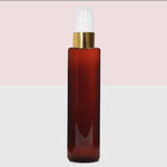 Load image into Gallery viewer, Amber Bottle, Lotion Pump Bottle, Gold Plated Lotion Pump Bottle, Zenvista Packagings, Packaging Experts, Packaging Solutions
