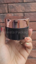 Load and play video in Gallery viewer, Empty Black color cosmetic jars with Rose gold cap 50gm &amp; 100gm [ZMJ18]
