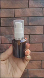 Load and play video in Gallery viewer, Amber Color Glass Bottle With White Cream Lotion Pump- 25ml,30ml  [ZMG59]
