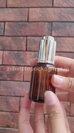 Load and play video in Gallery viewer, Amber Color Glass Bottle With Gold Silver Push Button Dropper-25ml,30 ML [ZMG55]
