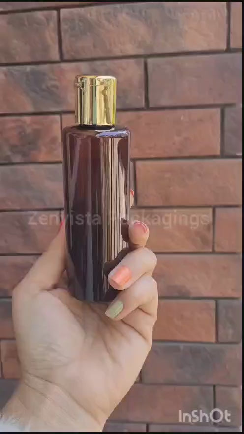 ZMA25| AMBER COLOR BOTTLE WITH GOLD PLATED FLIPTOP CAP Available Size: 50ml,100ml