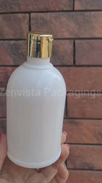 Load and play video in Gallery viewer, |ZMW24| Milky White Bottle With Golden Flip Top Cap-300 ML
