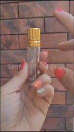 Load and play video in Gallery viewer, Cosmetic Glass Roll on Bottle with Beautiful Golden Cap - 10ml [ZMG24]
