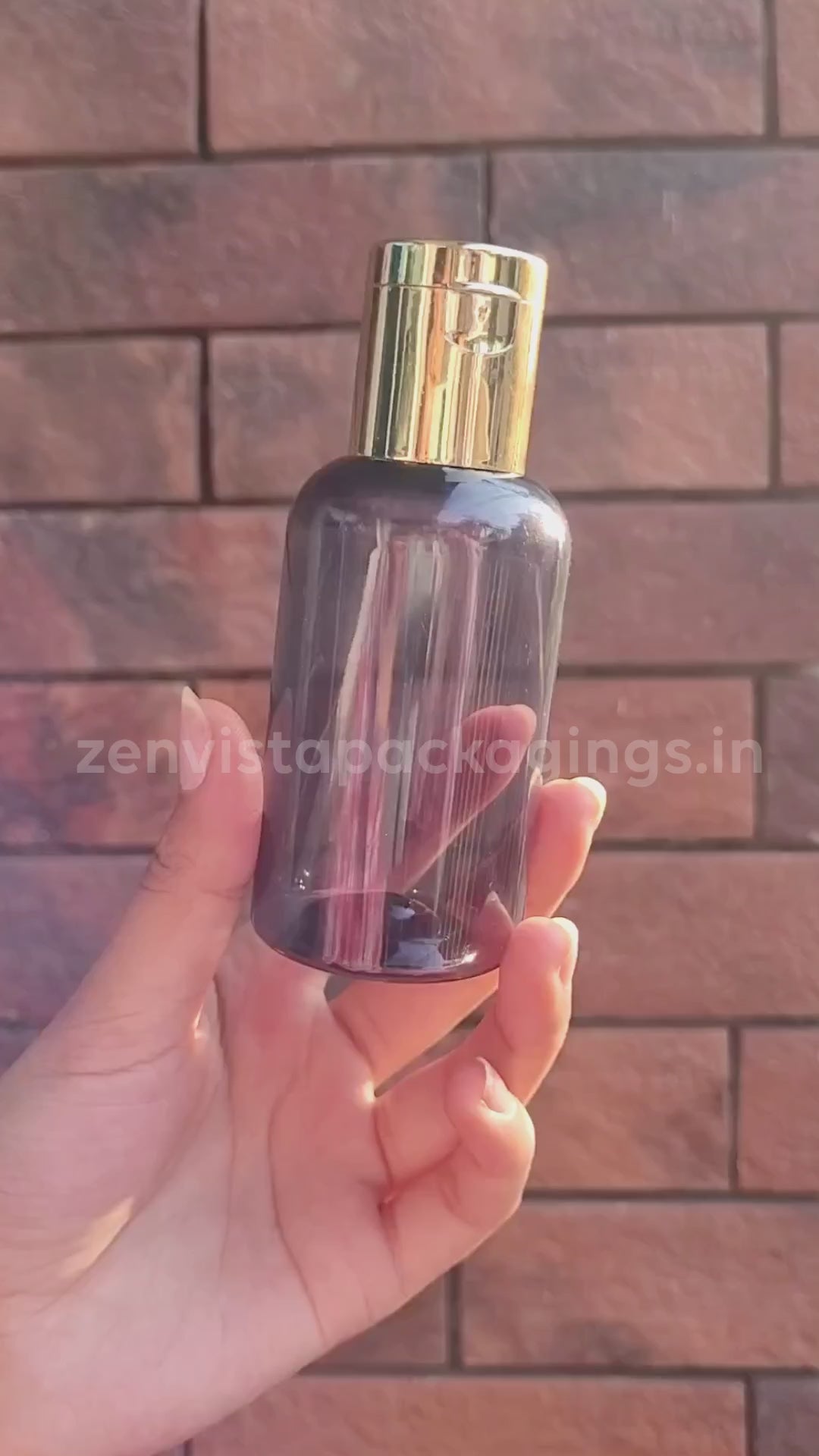Transparent Black Color Pet Bottle With Gold Plated Fliptop Cap 100ml [ZMT100]