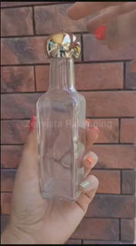 Load and play video in Gallery viewer, Transparent Glass Bottle With Golden Dome Cap-100ml [ZMG28]
