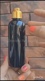 Load and play video in Gallery viewer, Black Color Bottle With Golden Locate  Cap-100ml &amp; 200ml [ZMK13]
