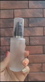Load and play video in Gallery viewer, Beautiful Frosted Glass Bottle With Black Lotion Pump [ZMG51] 25ML, 30ML, 50ML &amp; 100ml
