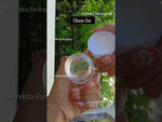 Load and play video in Gallery viewer, [ZMJ74] Glass Jar With White Metallized Cap - 15 gm
