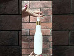 Load and play video in Gallery viewer, Milky White Bottle With Gold Plated Dispenser Pump For Lotion-200 ML [ZMW12]
