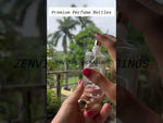 Load and play video in Gallery viewer, [ZMS16] Transparent Round Glass Perfume Bottle With Gold Cap - 50ml
