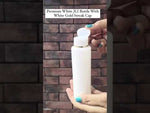 Load and play video in Gallery viewer, [ZMW118] White JLI Bottle With White Gold Streak Cap
