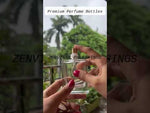 Load and play video in Gallery viewer, [ZMS09] Transparent Glass Perfume Bottle With Long Silver Cap - 50ml
