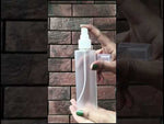 Load and play video in Gallery viewer, ( ZMT117 ) FLAT SHOULDER FROSTED PET ROUND BOTTLE WITH WHITE COLOR MIST SPRAY PUMP Available Size: 100ml &amp; 200ml
