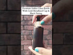 Load and play video in Gallery viewer, [ZMG141] Amber Frosted Bottle With Gold Metallized Cap &amp; Black Fitting
