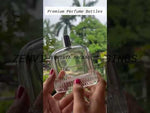 Load and play video in Gallery viewer, [ZMS53] Transparent Perfume Bottle With Silver Cap - 100ml
