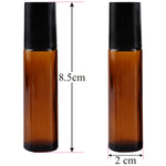 Load image into Gallery viewer, roll on bottles , glass roll on , 10 ml bottles , glass bottles , roll on bottles , black cap roll on bottles , amber color roll on bottles , glass roll on , 10 ml roll on , bottles for lip balm , essential oil bottles , fragrance oil bottles , roll on amber color
