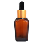 Load image into Gallery viewer, square shape bottle , glass bottle , 20ml amber color dropper , empty bottles , gold plated droppers , droppers for eye , droppers for ear , amber square shape droppers , 20ml square shape droppers.
