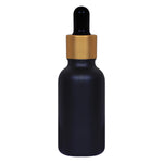 Load image into Gallery viewer, black glass , glass black color bottles , 30ml black droppers , gold plated black droppers , droppers for essential oils , glass droppers , black frosted glass, gold plated black droppers , 30 ml droppers .
